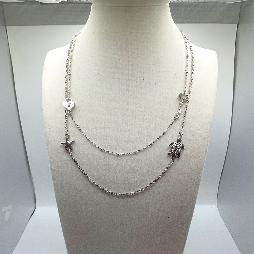 Crimzonrose layerd silver necklaces NWOT